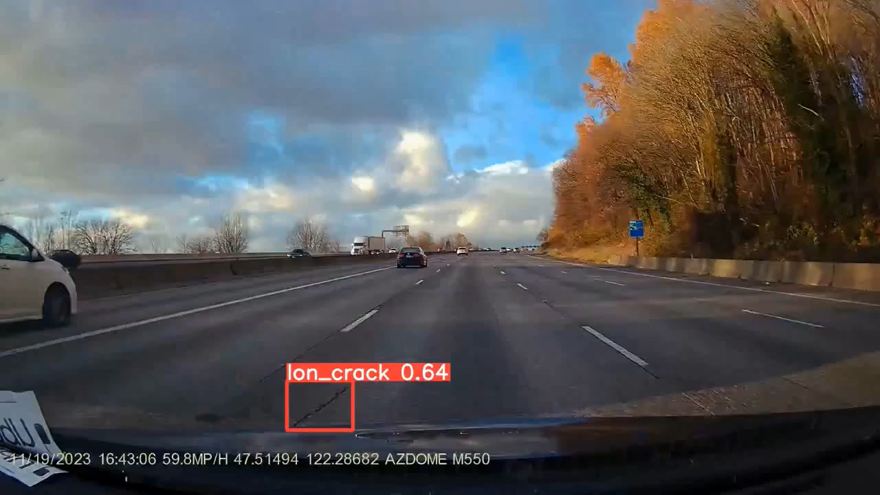 Pavement defects detected and annotated on a road surface
